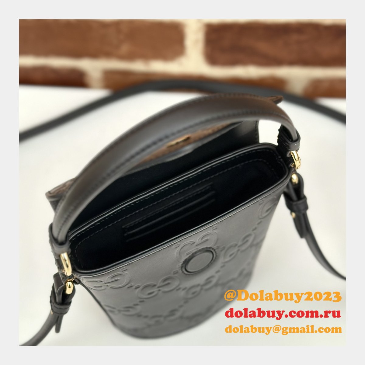 G*u*i 772795 uk embossed top handle replicas shoulder bag