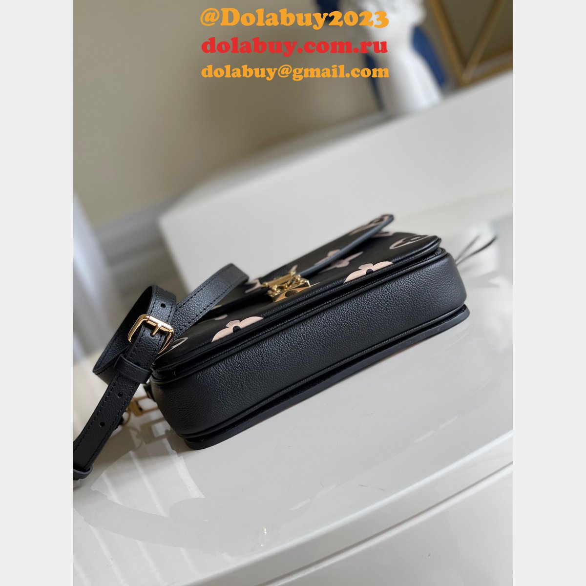 Louis Vuitton Bicolor Monogram Empreinte Leather M45773 Pochette Métis