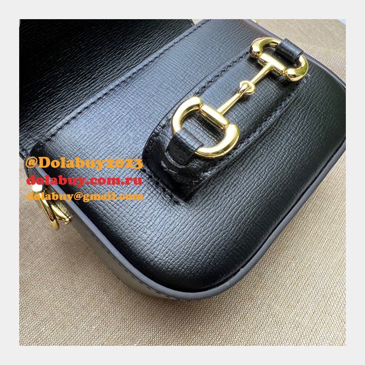 the replica G*u*i 699760 high quality horsebit 1955 strap wallet