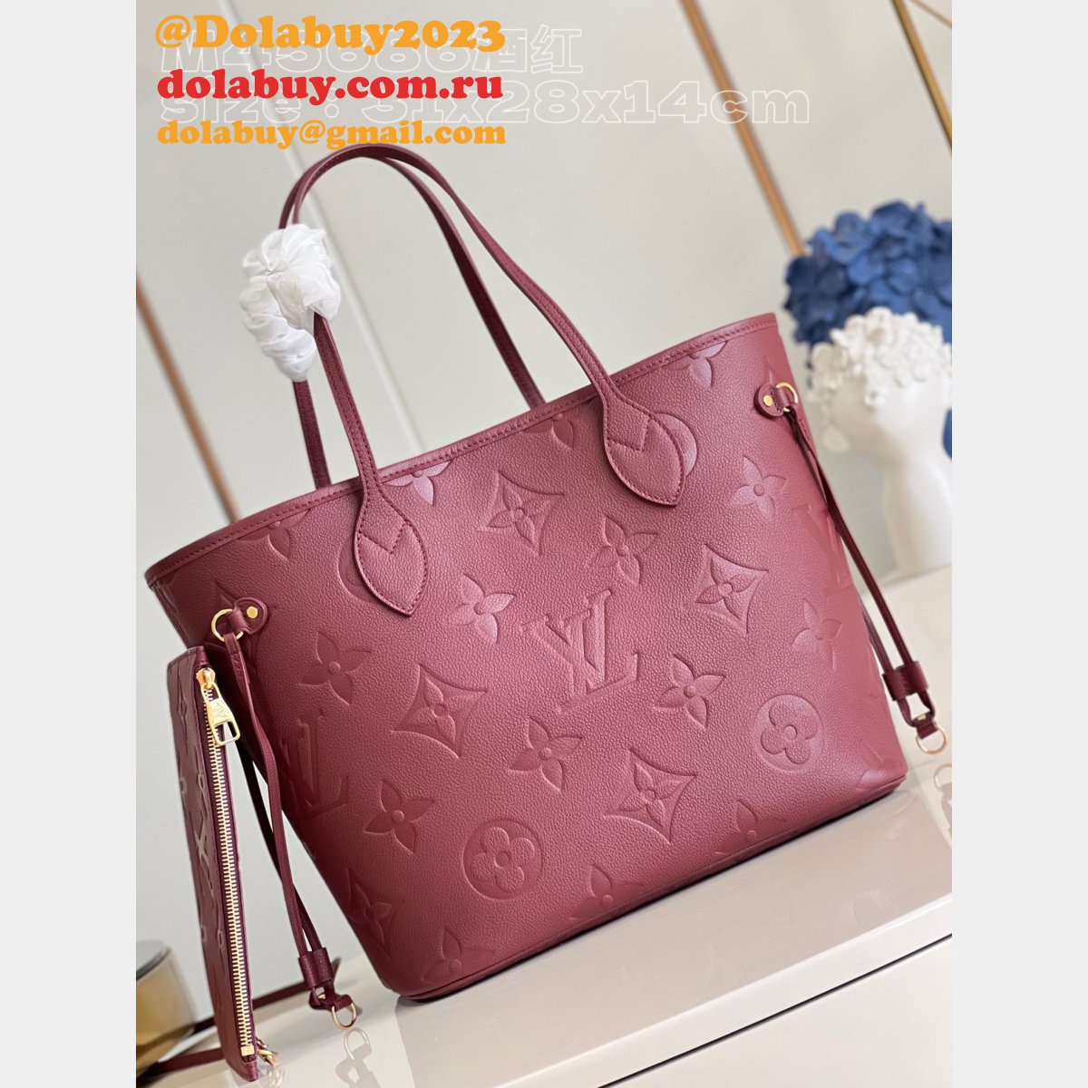 Duplicate M46599 Neverfull Monogram Empreinte Louis Vuitton Replica Bag