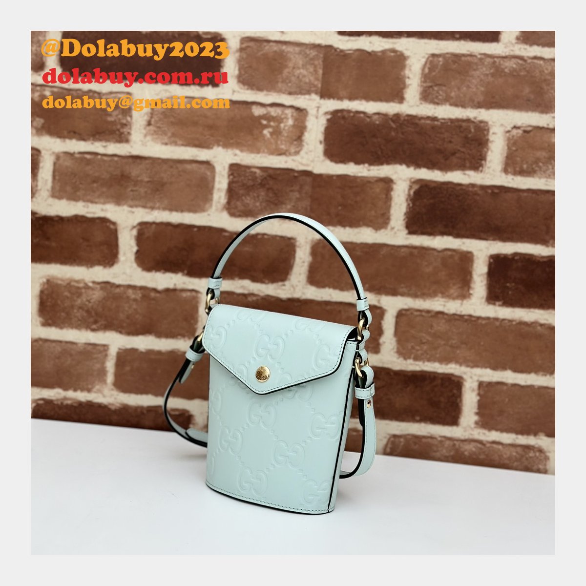 G*u*i 772795 uk embossed top handle replicas shoulder bag