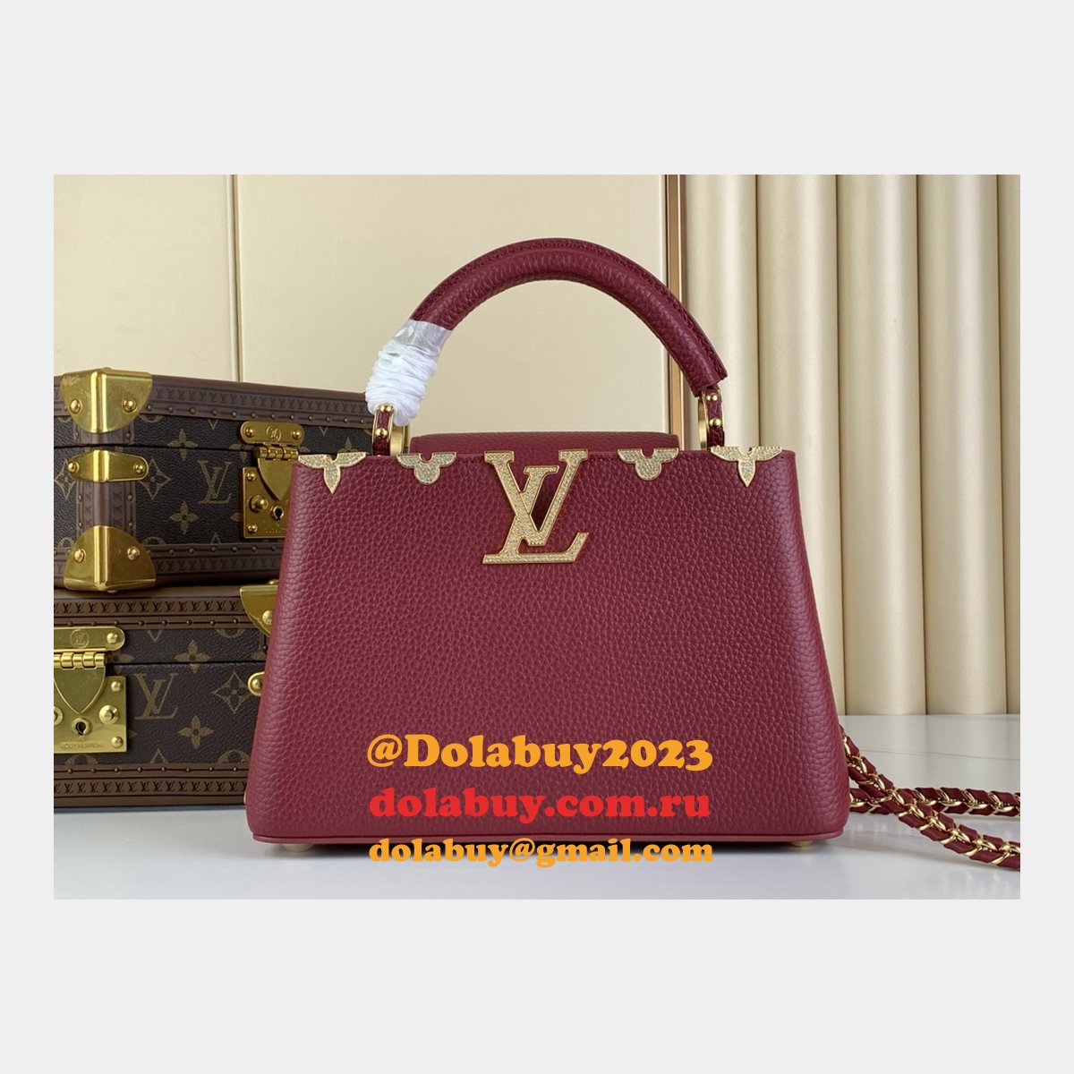 The Dolabuy Replica Capucines Louis Vuitton M48865 M24583 Bag
