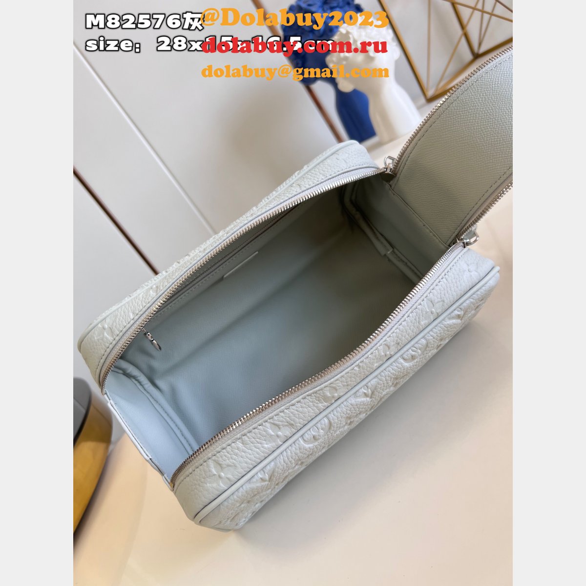 Travel Dopp Kit Taurillon Men M82576 Designer Louis Vuitton Fake Bag