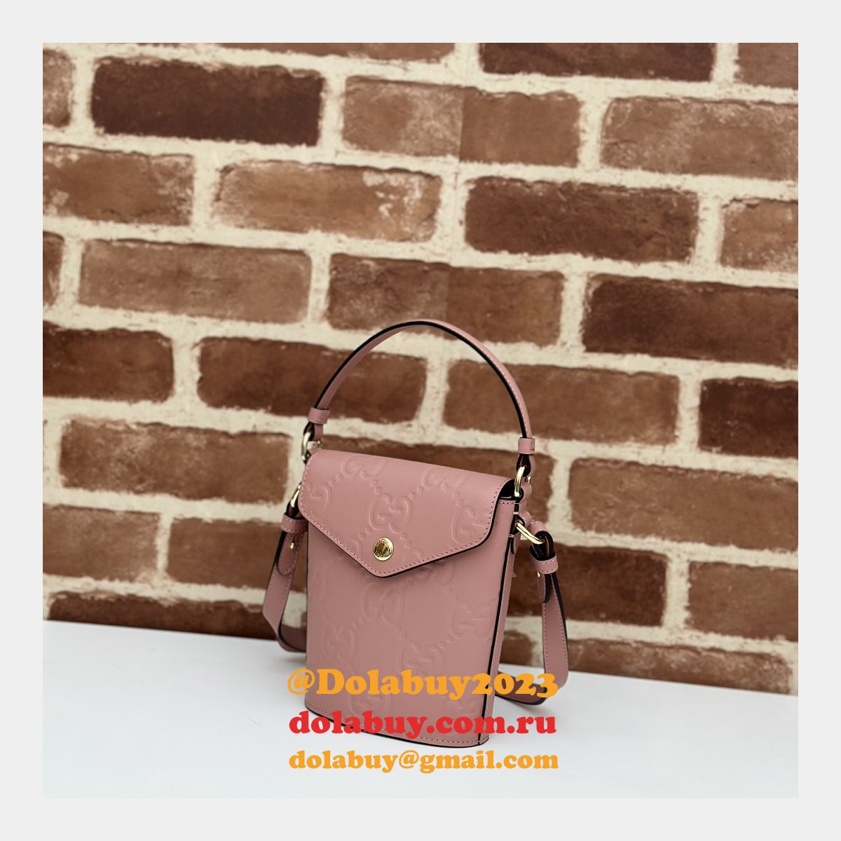 G*u*i 772795 uk embossed top handle replicas shoulder bag