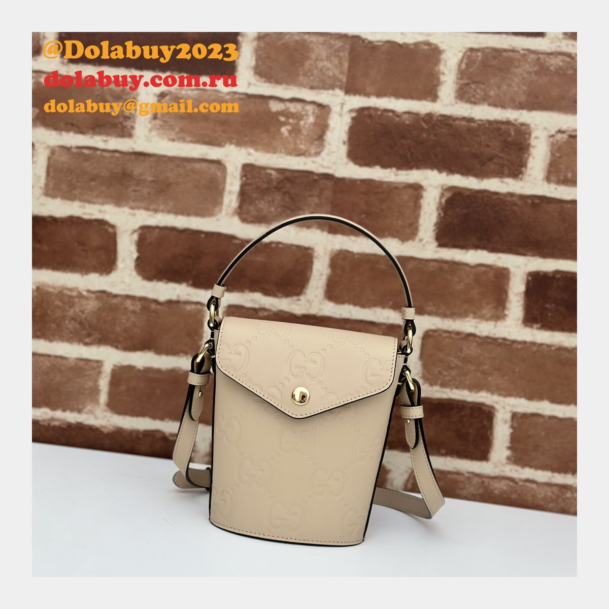G*u*i 772795 uk embossed top handle replicas shoulder bag
