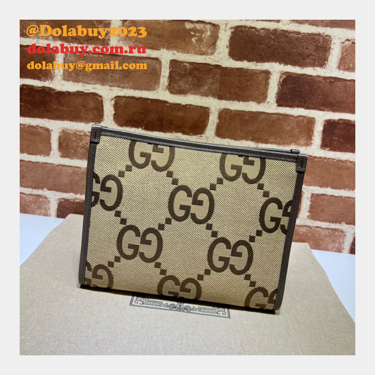 Gucci Replica 699318 Clutches Jumbo GG pouch camel ebony GG canvas