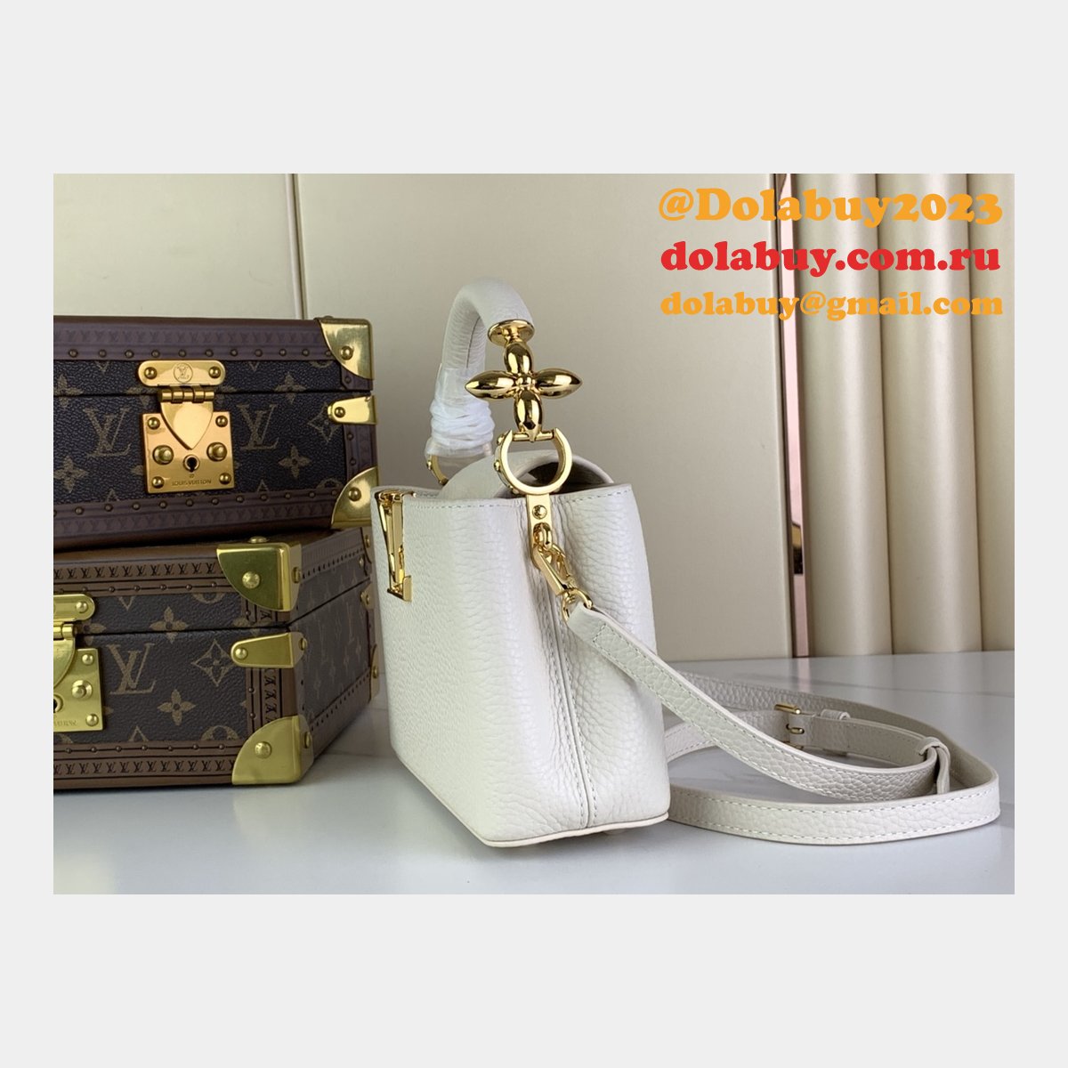 The Capucines M48865 M24989 M24698 Louis Vuitton Designer Replica Bag