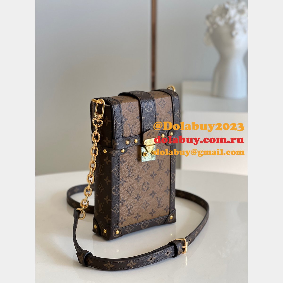 Louis Vuitton Buy Cheap Vertical Trunk Pochette M67873 Monogram Reverse from China